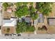 An aerial shot features well-maintained homes and tree coverage, with a clear view of roof styles and driveways at 2014 10Th Nw St, Winter Haven, FL 33881