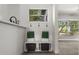 Mud room with decorative elements, hooks, and convenient storage at 2014 10Th Nw St, Winter Haven, FL 33881