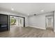 This living room features a fireplace and direct access to another living area at 2014 10Th Nw St, Winter Haven, FL 33881