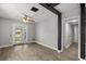 Cozy living room with access to patio and a hallway at 2014 10Th Nw St, Winter Haven, FL 33881