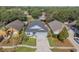 Aerial view of home showing roof, landscaping, and long driveway at 2098 Carpathian Dr, Apopka, FL 32712