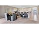 Bright, open-concept dining area features a table and chairs with seating for six adjacent to the kitchen at 211 Taylor Groves Dr, Lake Wales, FL 33853