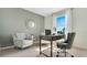 Bright home office space with comfortable seating, stylish decor, and natural light at 211 Taylor Groves Dr, Lake Wales, FL 33853