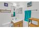 Clean bathroom with a bright vanity, a decorative mirror and wall decor at 2658 Palmetto Ridge Cir, Apopka, FL 32712