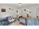 Bright bedroom featuring two beds and an ensuite bathroom at 2658 Palmetto Ridge Cir, Apopka, FL 32712