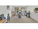 Bonus room features multiple workstations and natural light at 2658 Palmetto Ridge Cir, Apopka, FL 32712