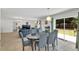 Open dining area connected to the kitchen and living space, with sliding doors to the backyard at 2658 Palmetto Ridge Cir, Apopka, FL 32712
