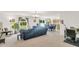 Open concept living area with a seamless flow into the dining and kitchen at 2658 Palmetto Ridge Cir, Apopka, FL 32712