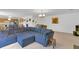 Open concept living area adjacent to kitchen and dining area at 2658 Palmetto Ridge Cir, Apopka, FL 32712