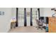 Comfortable office space featuring a computer setup, desk, and natural light at 2658 Palmetto Ridge Cir, Apopka, FL 32712