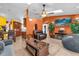 Bright living room flowing into the kitchen, offering an open concept layout with modern design at 2665 E Juliet Dr, Deltona, FL 32738