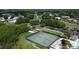 Aerial shot of tennis courts and parking in a beautiful community at 27127 Stoney Brook Dr, Leesburg, FL 34748