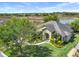 Beautiful single-Gathering home with manicured lawn and lush landscaping, near serene lake views at 27127 Stoney Brook Dr, Leesburg, FL 34748