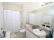 Clean bathroom with shower and tub combination and ample vanity space at 280 Celebration Blvd # 208, Kissimmee, FL 34747