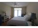 Cozy bedroom with wood floors, great natural light and ceiling fan at 280 Celebration Blvd # 208, Kissimmee, FL 34747