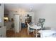 Inviting dining area with elegant table setting and open layout to kitchen at 280 Celebration Blvd # 208, Kissimmee, FL 34747