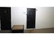 Condo entryway featuring a dark wood door, unit number, and welcome mat at 280 Celebration Blvd # 208, Kissimmee, FL 34747