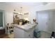 Bright kitchen with stainless steel appliances and breakfast bar at 280 Celebration Blvd # 208, Kissimmee, FL 34747
