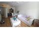 Cozy living room with hardwood floors, inviting seating, and ample natural light at 280 Celebration Blvd # 208, Kissimmee, FL 34747