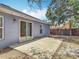 Backyard features a concrete patio and gray home exterior at 2818 Irondale St, Deltona, FL 32738