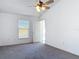 Bright bedroom with a window and ceiling fan provides a comfortable and inviting space at 2818 Irondale St, Deltona, FL 32738