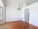 Bright dining room featuring wood floors and a classic chandelier at 2818 Irondale St, Deltona, FL 32738