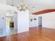 View of dining room and entry featuring wood floors and modern accents at 2818 Irondale St, Deltona, FL 32738