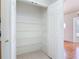 Walk-in pantry with shelving to maximize storage capacity at 2818 Irondale St, Deltona, FL 32738