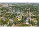 Neighborhood aerial view with a yellow pin highlighting property location amongst the surrounding greenery and cityscape at 3204 Amherst Ave, Orlando, FL 32804