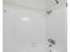 Bathroom featuring shower with white tile surround at 3204 Amherst Ave, Orlando, FL 32804