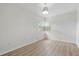 Cozy bedroom with hardwood floors and lots of natural light from the window at 3204 Amherst Ave, Orlando, FL 32804