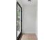 Foyer view showcasing the front door, tiled floor, and neutral wall paint at 3204 Amherst Ave, Orlando, FL 32804