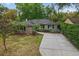 Charming home with manicured lawn, walkway, and driveway at 3204 Amherst Ave, Orlando, FL 32804