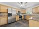Well-equipped kitchen with stainless steel appliances and granite countertops at 3204 Amherst Ave, Orlando, FL 32804