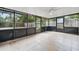 Spacious screened porch with tile floor and views of the backyard at 3204 Amherst Ave, Orlando, FL 32804