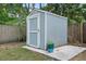 Backyard shed with fresh blue paint and trim at 3204 Amherst Ave, Orlando, FL 32804