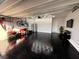 Well-organized garage with epoxy floors, overhead lighting, and plenty of storage space at 321 Jovana Rd, Davenport, FL 33837