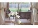 Indoor view showcasing access to an outdoor patio through a large sliding glass door and curtains at 416 Calabria Ave, Davenport, FL 33897