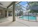 Relaxing screened-in pool area with -proof fence and an inviting outdoor living space at 4411 Little Water St, Orlando, FL 32817