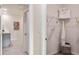 Walk-in closet with ample storage space, shelving, and easy access to bathroom at 4582 Boxwood Way, Mount Dora, FL 32757