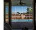 Backyard view showcasing a screened-in pool and brick patio at 4837 Lorraine Way, Orlando, FL 32812