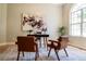 Bright home office featuring modern decor, a stylish desk, and a large window for natural light at 4837 Lorraine Way, Orlando, FL 32812