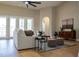 Open living room area with light wood floors and decorative rug at 4837 Lorraine Way, Orlando, FL 32812