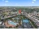 Aerial view showing home's location close to neighborhood pool and tennis at 5156 Oakbourne Ave, Davenport, FL 33837