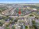 Discover this charming neighborhood from above, showcasing well-maintained homes and lush landscaping at 5156 Oakbourne Ave, Davenport, FL 33837