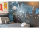 Bedroom showcasing a cozy bed and a themed Hogwarts wall at 5156 Oakbourne Ave, Davenport, FL 33837