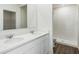 Clean bathroom featuring dual sinks, white countertops, and a stand-up shower at 5258 Scrub Mint, Apopka, FL 32712
