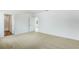 Carpeted bedroom featuring doorway and a window providing lots of natural light at 5258 Scrub Mint, Apopka, FL 32712