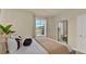 Bright bedroom with a comfortable bed, soft pillows, curtains, large window, and a serene view at 5282 Scrub Mint Ln, Apopka, FL 32712