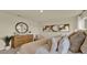 Chic bedroom featuring a king bed, elegant decor, and a soothing neutral color scheme at 5282 Scrub Mint Ln, Apopka, FL 32712